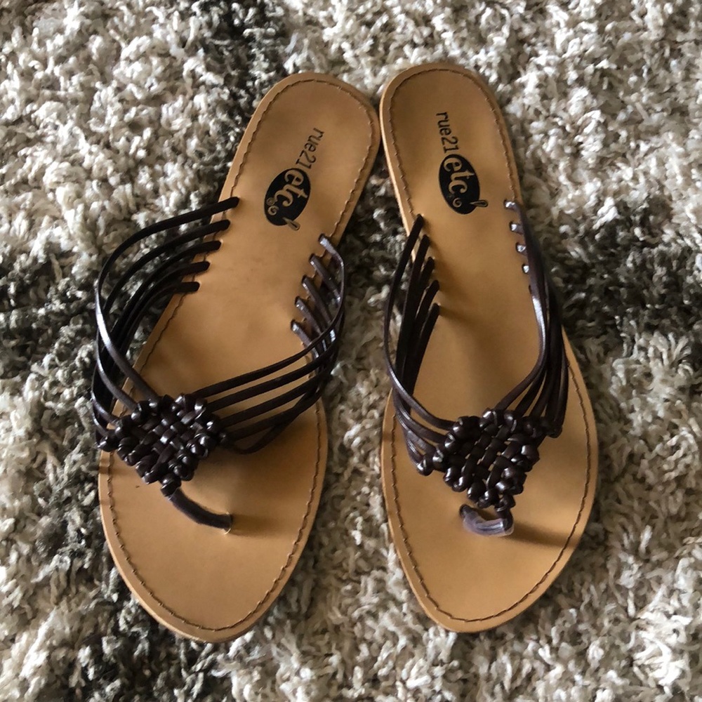 Women’s brown flip flops